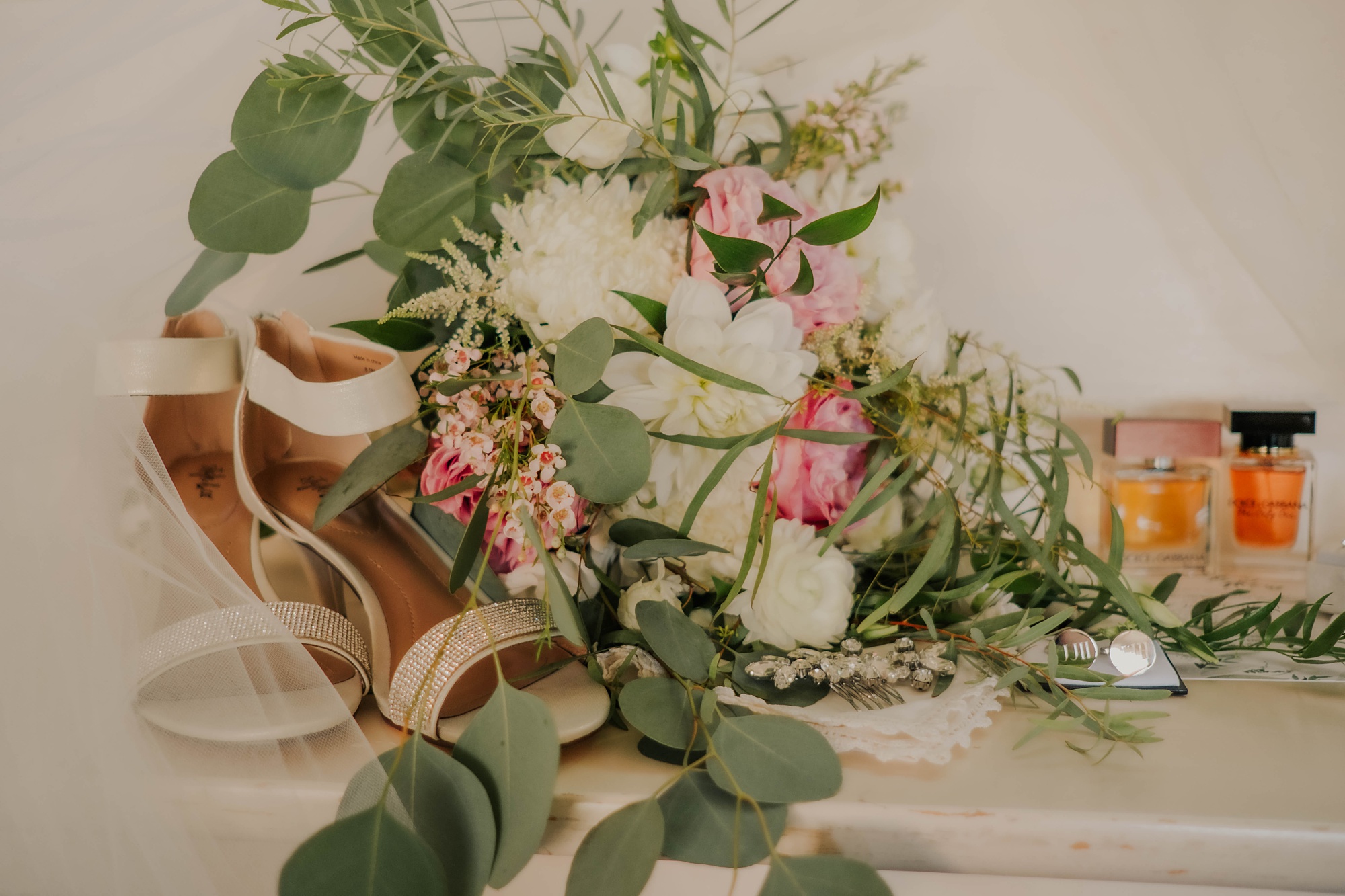 bride's bouquet and shoes for elegant fall wedding day