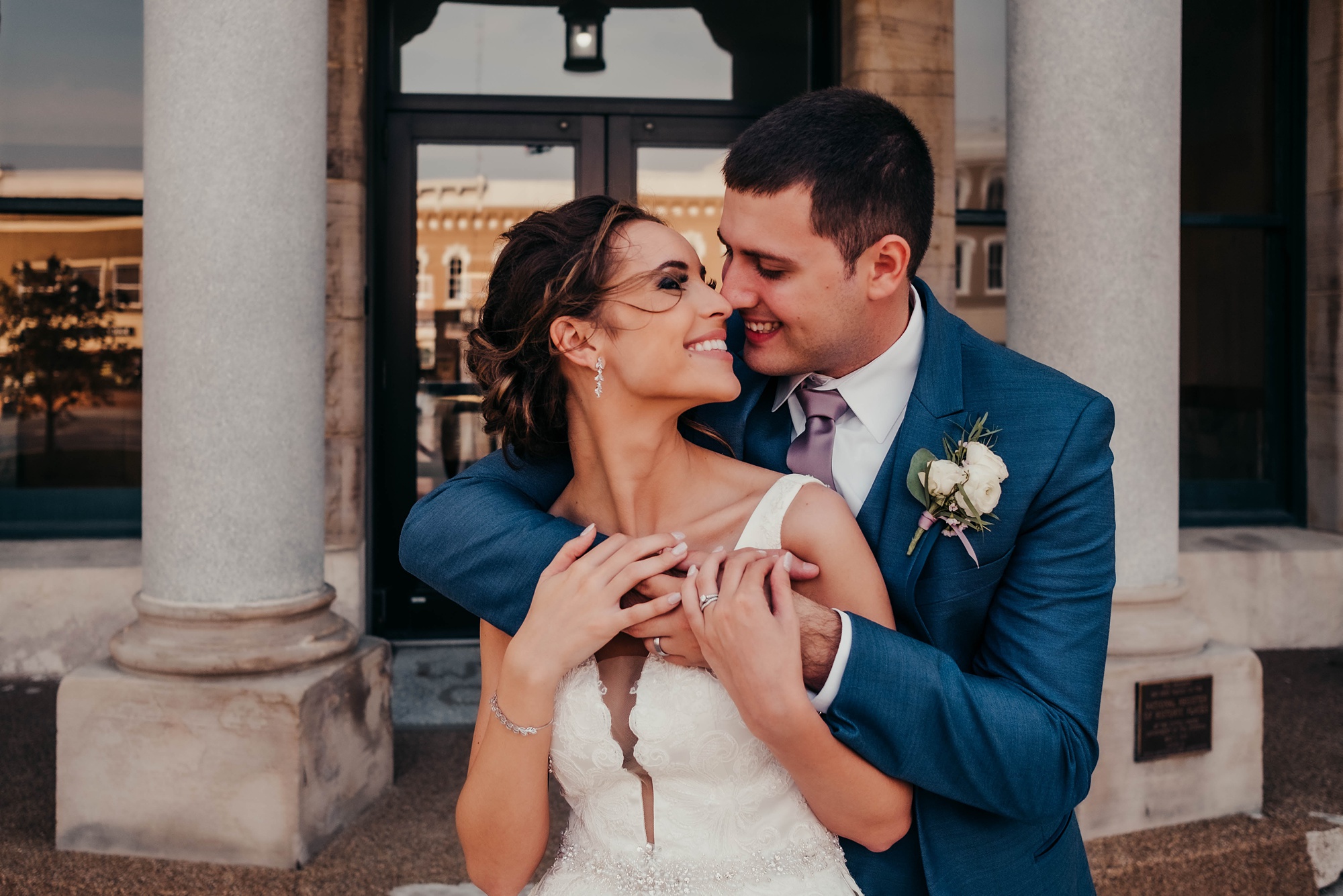 bride and groom hug touching noses during Ohio wedding photos