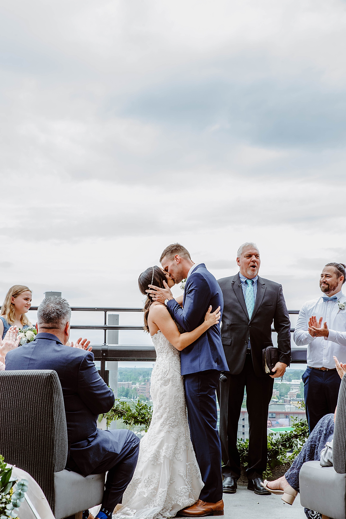 bride and groom kiss during ceremony at The Renaissance Hotel