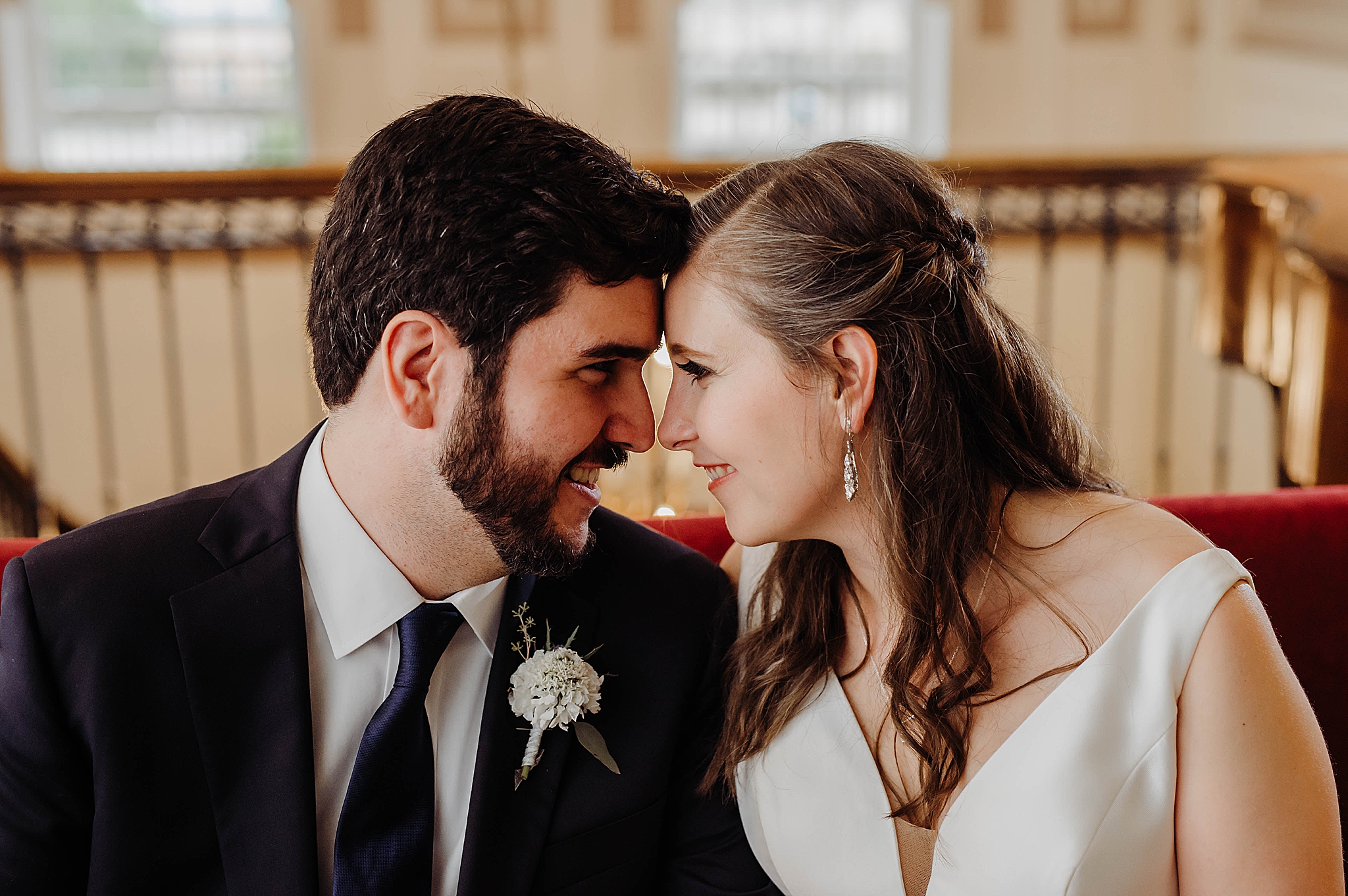 bride and groom touch noses during Ohio wedding photos